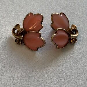 Vintage Trifari pink milk glass earrings.